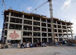custo da construção, imposto alto, falta de material